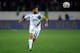 AGADIR, MOROCCO - DECEMBER 14: Mohsine Moutaouali of Casablanca runs with the ball during the FIFA Club World Cup Quarterfinal match between Raja Casablanca and CF Monterrey at Agadir Stadium on December 14, 2013 in Agadir, Morocco. (Photo by Lars Baron/