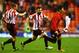 SUNDERLAND, ENGLAND - DECEMBER 17: Ki Sung-Yong of Sunderland celebrates scoring the winning goal in extra with Andrea Dossena and Lee Cattermole of Sunderland during the Capital One Cup Quarter-Final match between Sunderland and Chelsea at Stadium of L