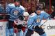 Brooks Orpik, left, and Paul Martin have been absent from the Penguins lineup for five and 13 games, respectively.