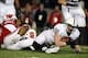 Nov 30, 2013; Madison, WI, USA; Penn State Nittany Lions running back Zach Zwinak stretches for extra yardage as Wisconsin Badgers safety Dezmen Southward (12) defends at Camp Randall Stadium. Penn State defeated Wisconsin 31-24. Mandatory Credit: Mary L
