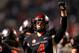 Dec 7, 2013; Fresno, CA, USA; Fresno State Bulldogs quarterback Derek Carr (4) looks towards the crowd after the Bulldogs defeated the Utah State Aggies 24-17 at Bulldog Stadium. Mandatory Credit: Cary Edmondson-USA TODAY Sports