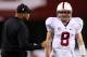 TEMPE, AZ - DECEMBER 07: Quarterback Kevin Hogan #8 of the Stanford Cardinal talks with head coach David Shaw during the Pac 12 Championship game against the Arizona State Sun Devils at Sun Devil Stadium on December 7, 2013 in Tempe, Arizona. (Photo by
