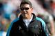 SAN FRANCISCO, CA - NOVEMBER 10: Head Coach Ron Rivera of the Carolina Panthers looks on while his team stretches prior to playing the San Francisco 49ers at Candlestick Park on November 10, 2013 in San Francisco, California. (Photo by Thearon W. Hender