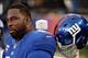 Dec 15, 2013; East Rutherford, NJ, USA; New York Giants defensive end Justin Tuck (91) looks on against the Seattle Seahawks during the second half at MetLife Stadium. The Seahawks won the game 23-0. Mandatory Credit: Joe Camporeale-USA TODAY Sports