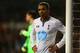 LONDON, ENGLAND - DECEMBER 15: A dejected Aaron Lennon of Tottenham Hotspur looks on during the Barclays Premier League match between Tottenham Hotspur and Liverpool at White Hart Lane on December 15, 2013 in London, England. (Photo by Paul Gilham/Getty I
