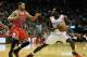 HOUSTON, TX - DECEMBER 18: Patrick Beverley #2 of the Houston Rockets looks to pass against D.J. Augustin #14 of the Chicago Bulls during the game at Toyota Center on December 18, 2013 in Houston, Texas. NOTE TO USER: User expressly acknowledges and agree