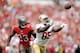 TAMPA, FL - DECEMBER 15: Vernon Davis #85 of the San Francisco 49ers reaches for a pass in front of Mark Barron #23 of the Tampa Bay Buccaneers during a game at Raymond James Stadium on December 15, 2013 in Tampa, Florida. (Photo by Stacy Revere/Getty I
