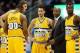 Dec 17, 2013; Denver, CO, USA; Denver Nuggets head coach Brian Shaw talks with members of his bench including forward Jordan Hamilton (1), forward Darrell Arthur (00), guard Evan Fournier (94), and center Timofey Mozgov (25) during the second half against