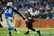 Dec 16, 2013; Detroit, MI, USA; Baltimore Ravens wide receiver Torrey Smith (82) makes a catch while being defended by Detroit Lions free safety Louis Delmas (26) during the first quarter at Ford Field. Mandatory Credit: Andrew Weber-USA TODAY Sports
