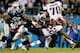 Kuechly makes a stop against the New England Patriots earlier in the year.