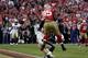 SAN FRANCISCO, CA - JANUARY 14: Vernon Davis #85 of the San Francisco 49ers catches a 14 yard touchdown pass in the fourth quarter against the New Orleans Saints during the NFC Divisional playoff game at Candlestick Park on January 14, 2012 in San Franci