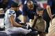GLENDALE, AZ - OCTOBER 17: Wide receiver Golden Tate #81 of the Seattle Seahawks is looked at by team trainers after an injury during the third quarter of the NFL game against the Arizona Cardinals at the University of Phoenix Stadium on October 17, 2013