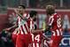 ATHENS, GREECE - SEPTEMBER 17: Olympiacos FC players celebrate team-mates Vladimir Weiss goal during the UEFA Champions League group stage match between Olympiacos FC and Paris Saint-Germain FC held on September 17, 2013 at the Georgios Karaiskakis Stadi