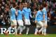 MANCHESTER, ENGLAND - DECEMBER 14: Fernandinho of Manchester City celebrates with team mates after scoring their third goal during the Barclays Premier League match between Manchester City and Arsenal at Etihad Stadium on December 14, 2013 in Manchester,
