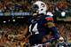 ATLANTA, GA - DECEMBER 07: Quarterback Nick Marshall #14 of the Auburn Tigers celebrates scoring a touchdown in the first quarter against the Missouri Tigers during the SEC Championship Game at Georgia Dome on December 7, 2013 in Atlanta, Georgia. (Phot
