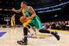LOS ANGELES, CA - FEBRUARY 20: Courtney Lee #11 of the Boston Celtics drives to the basket against the Los Angeles Lakers at Staples Center on February 20, 2013 in Los Angeles, California. NOTE TO USER: User expressly acknowledges and agrees that, by down