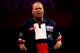 LONDON, ENGLAND - DECEMBER 15: Raymond van Barneveld of The Netherlands celebrates winning the second set during his first round match against Jamie Lewis of Wales on day three of the Ladbrokes.com World Darts Championships at Alexandra Palace on Decembe