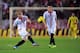 SEVILLE, SPAIN - NOVEMBER 02: Ivan Rakitic (L) of Sevilla FC crosses the ball during the La Liga match between Sevilla FC and Celta de Vigo at Estadio Ramon Sanchez Pizjuan on November 2, 2013 in Seville, Spain. (Photo by Denis Doyle/Getty Images)