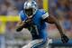 DETROIT, MI - OCTOBER 27: Reggie Bush #21 of the Detroit Lions tries to get around the end while playing the Dallas Cowboys during a fourth quarter run at Ford Field on October 27, 2013 in Detroit, Michigan. Detroit won the game 31-30.(Photo by Gregory Sh