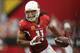 GLENDALE, AZ - SEPTEMBER 15: Wide receiver Larry Fitzgerald #11 of the Arizona Cardinals runs with the football after a reception during the NFL game against the Detroit Lions at the University of Phoenix Stadium on September 15, 2013 in Glendale, Arizon