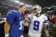 Sep 8, 2013; Arlington, TX, USA; Dallas Cowboys quarterback Tony Romo (9) talks with New York Giants quarterback Eli Manning (10) after the game at AT&T Stadium. The Dallas Cowboys beat the New York Giants 36-31. Mandatory Credit: Matthew Emmons-USA TODAY