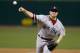 ST LOUIS, MO - OCTOBER 26: Jake Peavy #44 of the Boston Red Sox pitches against the St. Louis Cardinals during Game Three of the 2013 World Series at Busch Stadium on October 26, 2013 in St Louis, Missouri. (Photo by Pool/Getty Images)