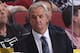 GLENDALE, AZ - OCTOBER 29: Head coach Darryl Sutter of the Los Angeles Kings watches from the bench during the NHL game against the Phoenix Coyotes at Jobing.com Arena on October 29, 2013 in Glendale, Arizona. The Coyotes defeated the Kings 3-1. (Photo