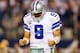 ARLINGTON, TX - DECEMBER 15: Quarterback Tony Romo #9 of the Dallas Cowboys reacts against the Green Bay Packers during a game at AT&T Stadium on December 15, 2013 in Arlington, Texas. (Photo by Ronald Martinez/Getty Images)