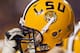 BATON ROUGE, LA - NOVEMBER 25: A LSU Tigers helmet is held up after a game against the Arkansas Razorbacks at Tiger Stadium on November 25, 2011 in Baton Rouge, Louisiana. The Tigers defeated the Razorbacks 41 to 17. (Photo by Wesley Hitt/Getty Images