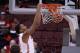 COLUMBUS, OH - DECEMBER 11: Amir Williams #23 of the Ohio State Buckeyes slam dunks two points in the first half against the Bryant Bulldogs on December 11, 2013 at Value City Arena in Columbus, Ohio. (Photo by Jamie Sabau/Getty Images)