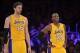 Dec 10, 2013; Los Angeles, CA, USA; Los Angeles Lakers forward Pau Gasol (16) and guard Kobe Bryant (24) react during the game against the Phoenix Suns at Staples Center. The Suns defeated the Lakers 114-108. Mandatory Credit: Kirby Lee-USA TODAY Sports
