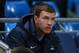 MANCHESTER, ENGLAND - DECEMBER 01: Edin Dzeko of Manchester City watches from the substitutes bench during the Barclays Premier League match between Manchester City and Swansea City at Etihad Stadium on December 1, 2013 in Manchester, England. (Photo by