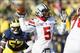Nov 30, 2013; Ann Arbor, MI, USA; Ohio State Buckeyes quarterback Braxton Miller (5) passes the ball in the second quarter against the Michigan Wolverines at Michigan Stadium. Mandatory Credit: Rick Osentoski-USA TODAY Sports