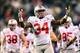 Dec 7, 2013; Indianapolis, IN, USA; Ohio State Buckeyes running back Carlos Hyde (34) pumps up the crowd prior to the 2013 Big 10 Championship game against the Michigan State Spartans at Lucas Oil Stadium. Mandatory Credit: Andrew Weber-USA TODAY Sports