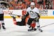PHILADELPHIA, PA - OCTOBER 17: Matt Niskanen #2 of the Pittsburgh Penguins upends Zac Rinaldo #36 of the Philadelphia Flyers on October 17, 2013 at the Wells Fargo Center in Philadelphia, Pennsylvania. (Photo by Len Redkoles/NHLI via Getty Images)