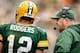 GREEN BAY, WI - SEPTEMBER 15: Aaron Rodgers #12 of the Green Bay Packers confers with head coach Mike McCarthy duirng a timeout against the Washington Redskins at Lambeau Field on September 15, 2013 in Green Bay, Wisconsin. (Photo by Matthew Stockman/Ge