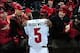 Dec 5, 2013; Cincinnati, OH, USA; Louisville Cardinals quarterback Teddy Bridgewater (5) hugs his mother after defeating the Cincinnati Bearcats 31-24 at Nippert Stadium. Mandatory Credit: Andrew Weber-USA TODAY Sports