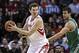 Nov 19, 2013; Houston, TX, USA; Houston Rockets center Omer Asik (3) controls the ball during the fourth quarter as Boston Celtics power forward Kris Humphries (43) defends at Toyota Center. The Rockets defeated the Celtics 109-85. Mandatory Credit: Troy