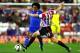 SUNDERLAND, ENGLAND - DECEMBER 17: Lee Cattermole of Sunderland tackles Willian of Chelsea during the Capital One Cup Quarter-Final match between Sunderland and Chelsea at Stadium of Light on December 17, 2013 in Sunderland, England. (Photo by Jan Krug