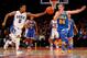 Dec 19, 2013; New York, NY, USA; UCLA Bruins forward Travis Wear (24) battles for the ball with Duke Blue Devils guard Quinn Cook (2) during the second half at Madison Square Garden. The Blue Devils won 80-63. Mandatory Credit: Adam Hunger-USA TODAY Sport