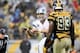 Nov 17, 2013; Pittsburgh, PA, USA; Detroit Lions quarterback Matthew Stafford (9) calls a play against Pittsburgh Steelers linebacker Jason Worilds (93) during the second half at Heinz Field. Pittsburgh won the game, 37-27. Mandatory Credit: Jason Bridge-