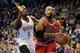 Dec 19, 2013; Oklahoma City, OK, USA; Chicago Bulls power forward Taj Gibson (22) dribbles the ball while defended by Oklahoma City Thunder power forward Serge Ibaka (9) during the second quarter at Chesapeake Energy Arena. Mandatory Credit: Mark D. Smith