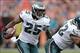 Sep 29, 2013; Denver, CO, USA; Philadelphia Eagles running back LeSean McCoy (25) rushes with the against the Denver Broncos in the third quarter at Sports Authority Field at Mile High. The Broncos won 52-20. Mandatory Credit: Ron Chenoy-USA TODAY Sports