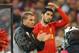 MELBOURNE, AUSTRALIA - JULY 24: Liverpool FC Manager Brendan Rodgers (L) looks on as Luis Suarez of Liverpool is substituted into the match during the match between the Melbourne Victory and Liverpool at the Melbourne Cricket Ground on July 24, 2013 in M