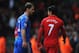 LIVERPOOL, ENGLAND - APRIL 21: Branislav Ivanovic of Chelsea talks with Luis Suarez of Liverpool as they walk in for half time during the Barclays Premier League match between Liverpool and Chelsea at Anfield on April 21, 2013 in Liverpool, England. (Ph