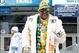 Nov 28, 2013; Detroit, MI, USA; Green Bay Packers fan identified as Pack Daddy poses for a picture before the game against the Detroit Lions during a NFL football game on Thanksgiving at Ford Field. Mandatory Credit: Tim Fuller-USA TODAY Sports