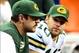 Nov 28, 2013; Detroit, MI, USA; Green Bay Packers quarterback Aaron Rodgers (left) sits on the bench next to quarterback Matt Flynn (10) during the fourth quarter of a NFL football game against the Detroit Lions on Thanksgiving at Ford Field. Mandatory Cr