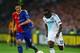 BASEL, SWITZERLAND - APRIL 25: Victor Moses (R) of Chelsea holds off the challenge of Fabian Schar (L) of FC Basel during the UEFA Europa League Semi Final First Leg match between FC Basel 1893 and Chelsea at St. Jakob Stadium on April 25, 2013 in Basel,