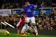 LIVERPOOL, ENGLAND - DECEMBER 14: Ross Barkley of Everton is challenged by Giorgos Karagounis of Fulham during the Barclays Premier League match between Everton and Fulham at Goodison Park on December 14, 2013 in Liverpool, England. (Photo by Paul Thomas