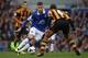 LIVERPOOL, ENGLAND - OCTOBER 19: Ross Barkley of Everton attempts to move past Curtis Davies of Hull City during the Barclays Premier League match between Everton and Hull City at Goodison Park on October 19, 2013 in Liverpool, England. (Photo by Clive